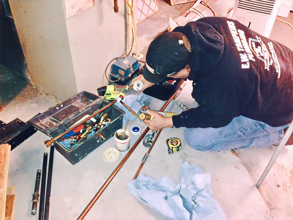 Slide of EW Tompkins Plumbing Heating Cooling