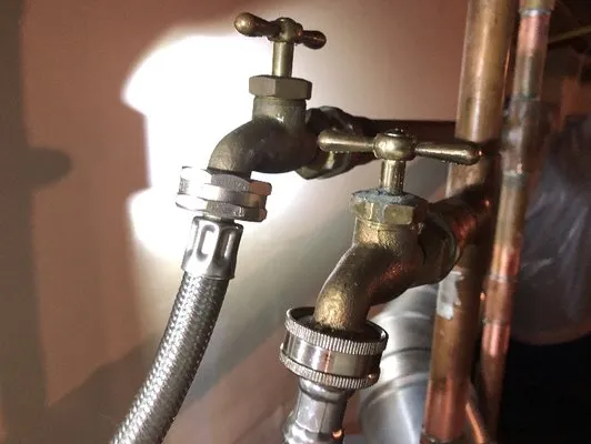 EW Tompkins Plumbing Heating Cooling Logo