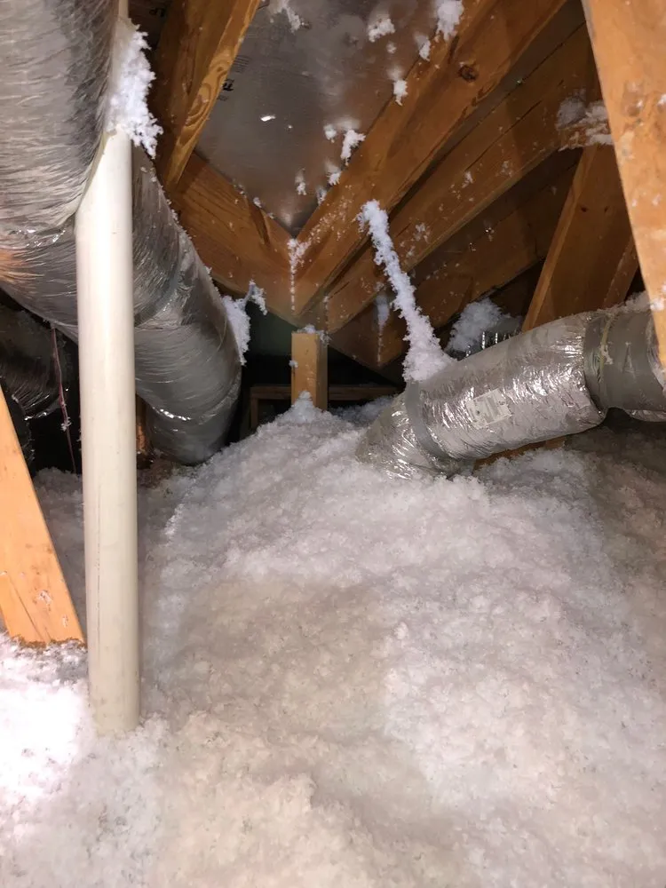 Slide of EZ Attic Insulation