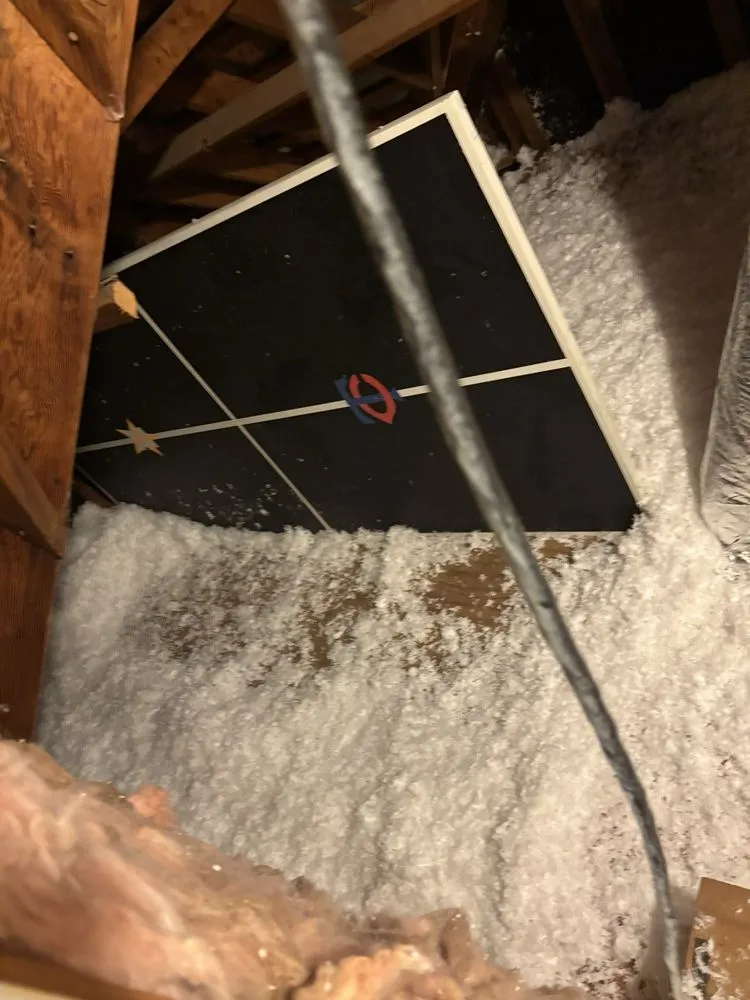 Slide of EZ Attic Insulation