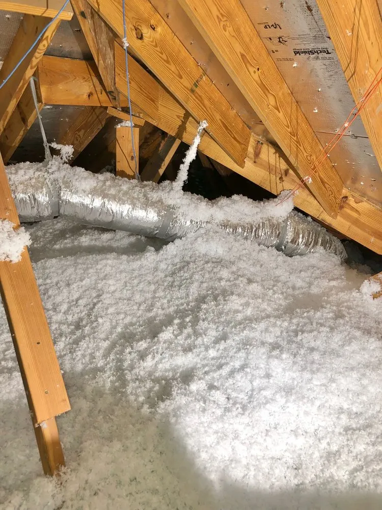 Slide of EZ Attic Insulation