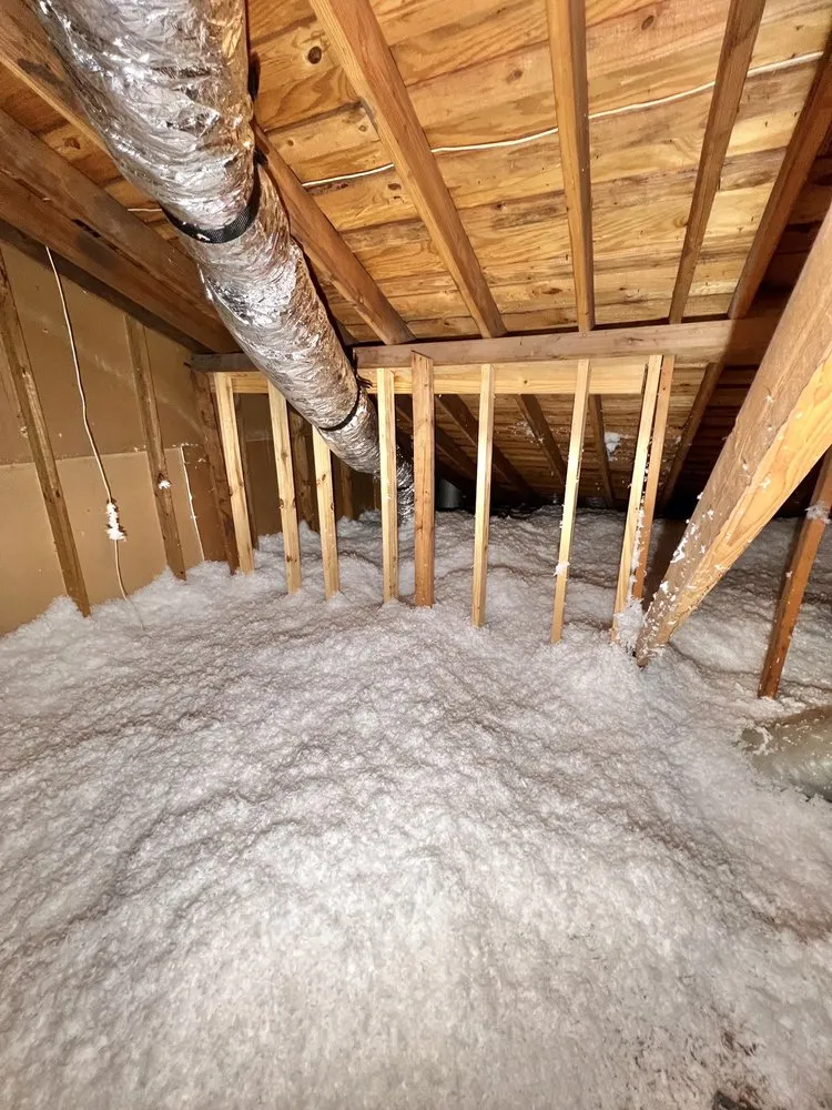 Slide of EZ Attic Insulation