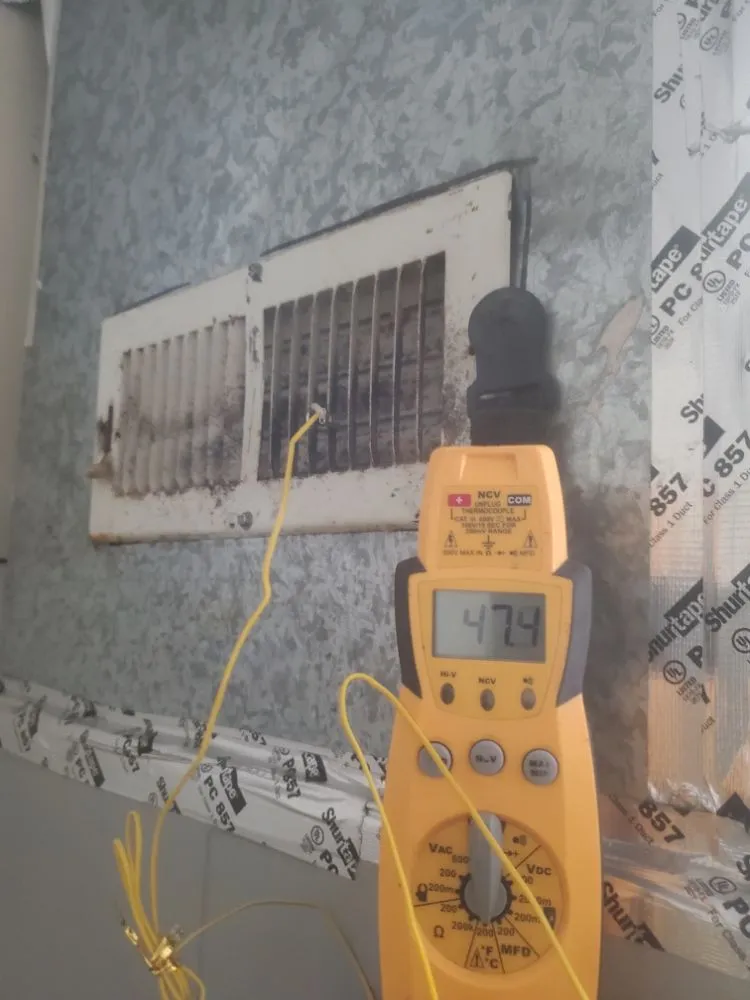 Slide of Family Man Heating & Cooling