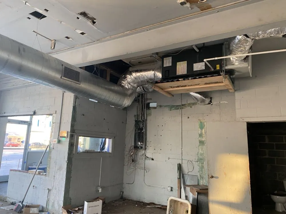 Slide of Father and Sons Heating and Cooling