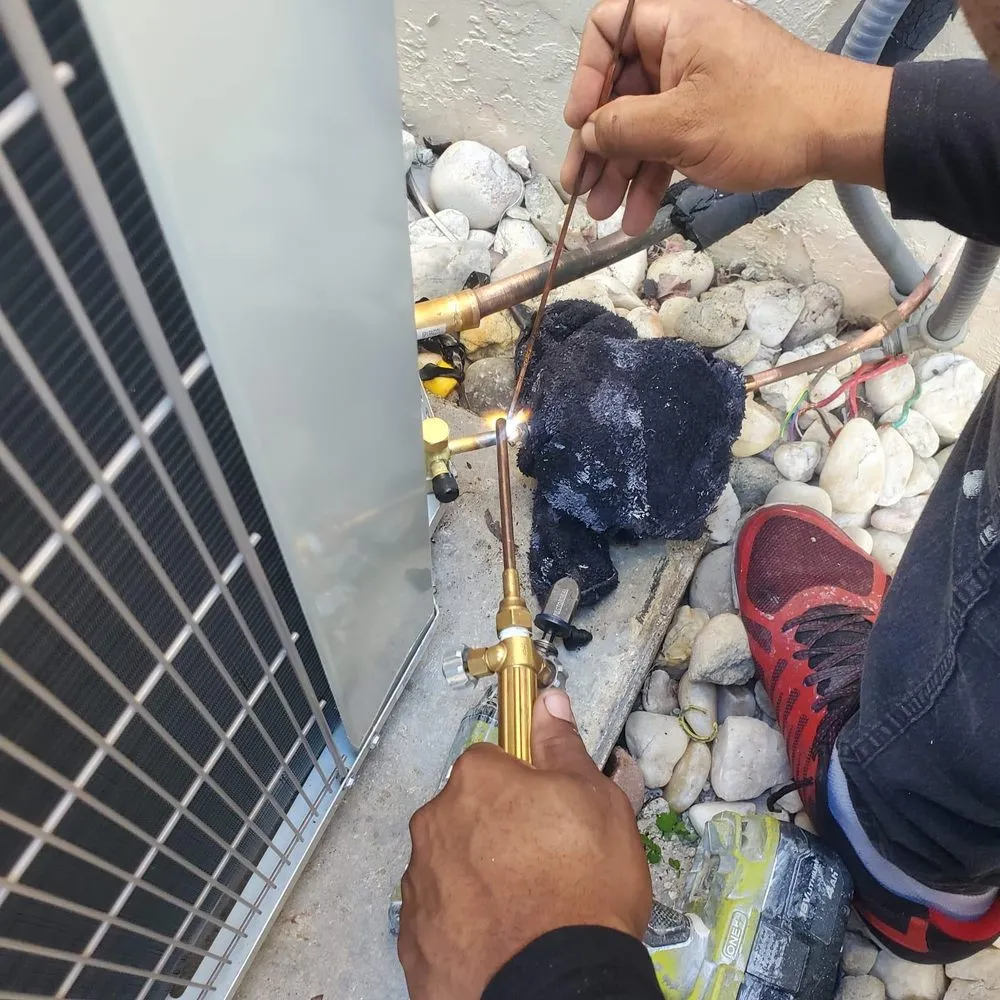 Slide of Feble’s A/C Technician