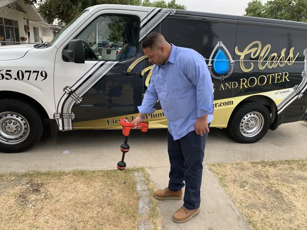 Slide of First Class Plumbing and Rooter