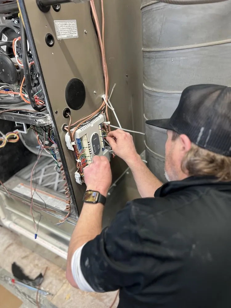 Slide of Fix It Frankie AC & Heating