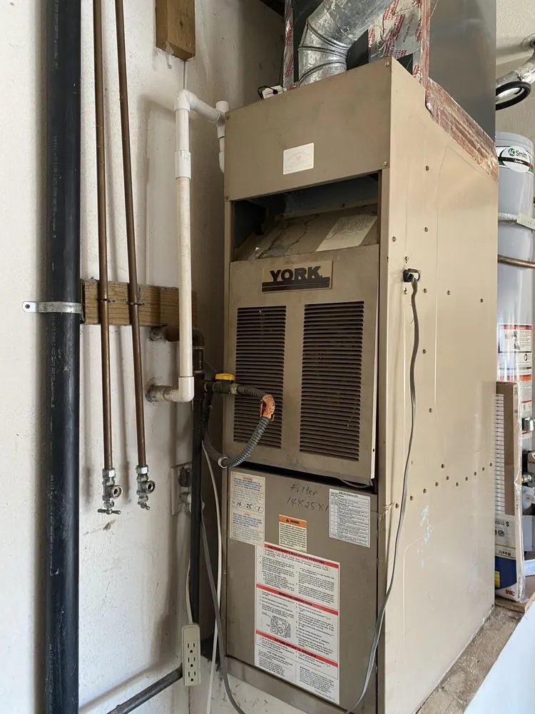 Slide of Frostys Heating and Air Conditioning