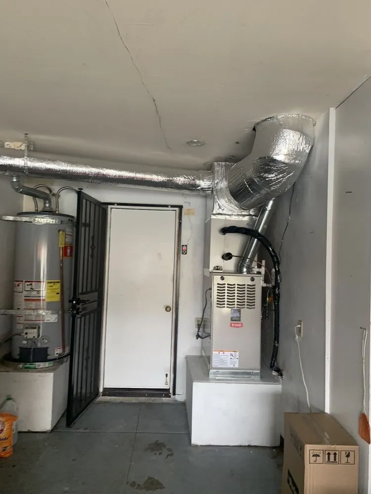 Slide of Genesis Heating and AC Repair