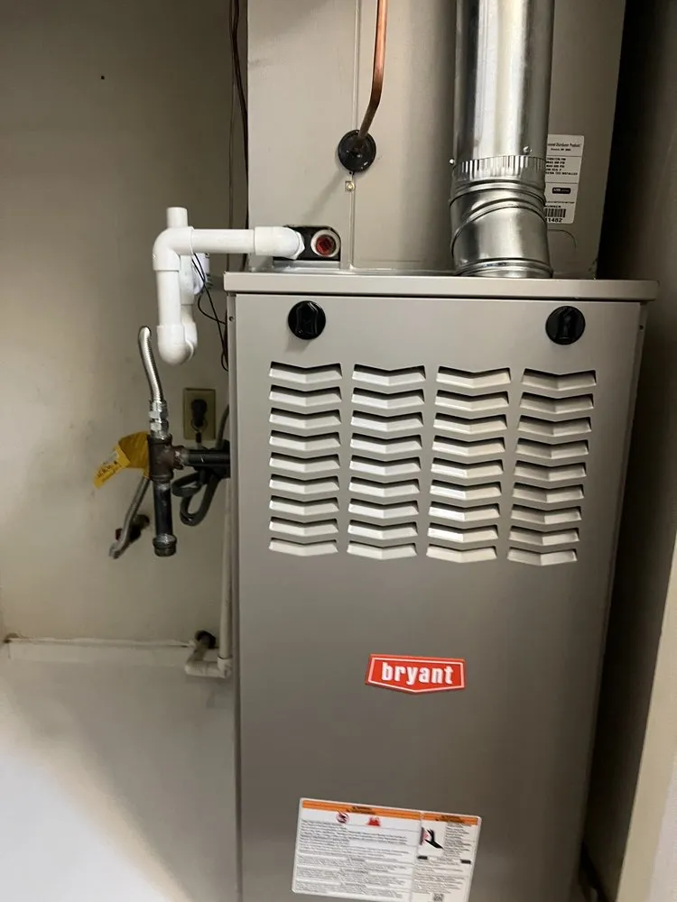Slide of Genesis Heating and AC Repair