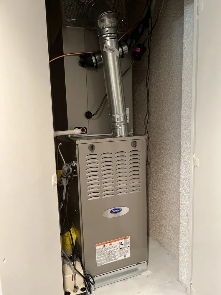 Slide of Genesis Heating and AC Repair