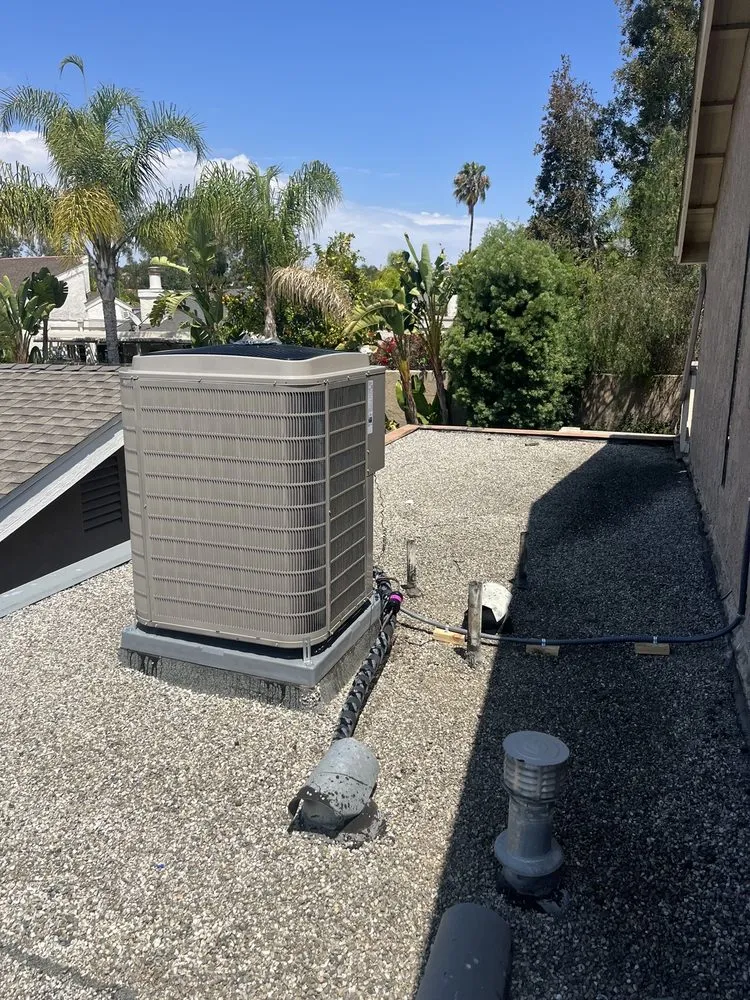 Slide of Genesis Heating and AC Repair