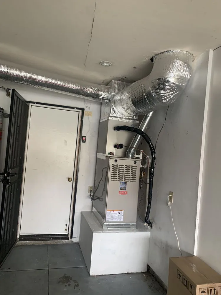 Slide of Genesis Heating and AC Repair