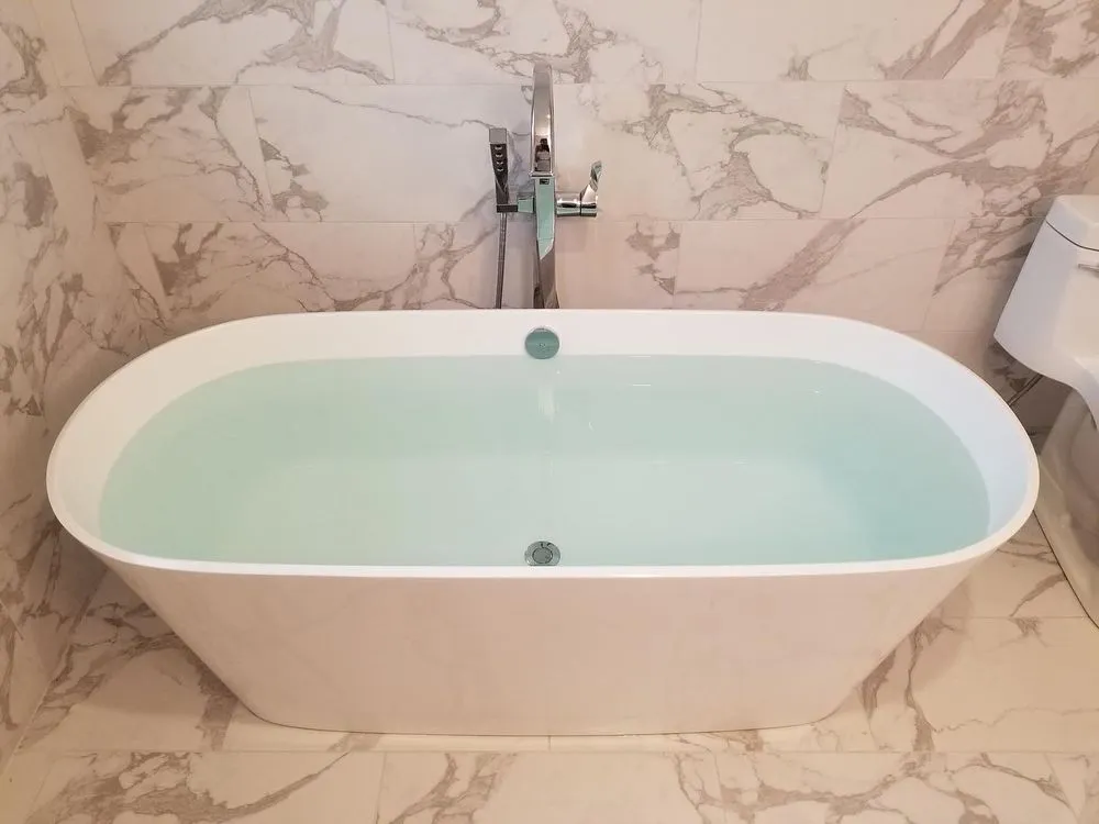 Slide of Gravesend Plumbing Company