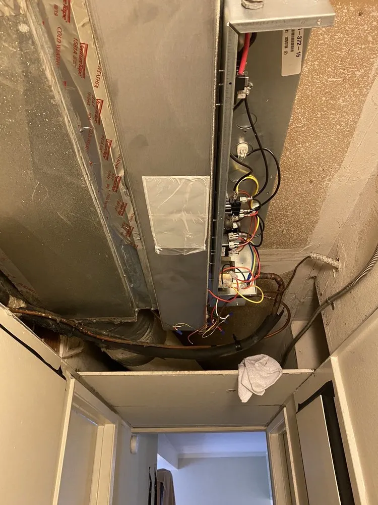 Slide of Guy's Heating and Air Conditioning