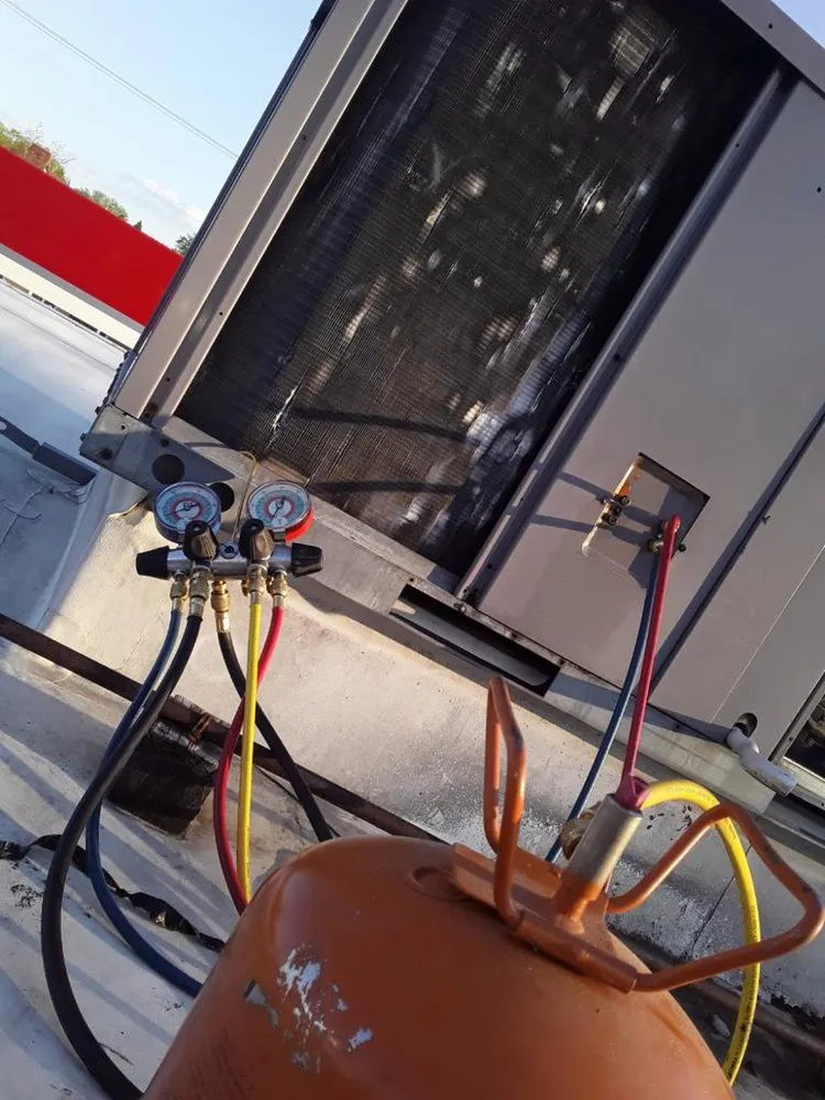 Slide of H & M Heating Cooling & Refrigeration