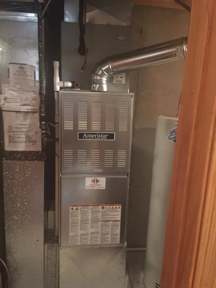 Slide of H & W Heating and Cooling