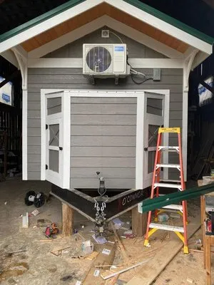 Halls Heating and Air Conditioning Logo