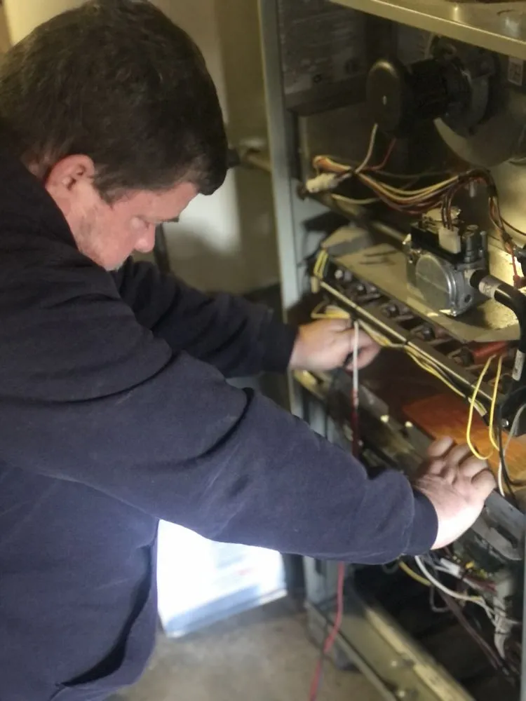Certified HVAC repair experts serving Lee's Summit, MO - Heartland Quality Heating & Cooling
