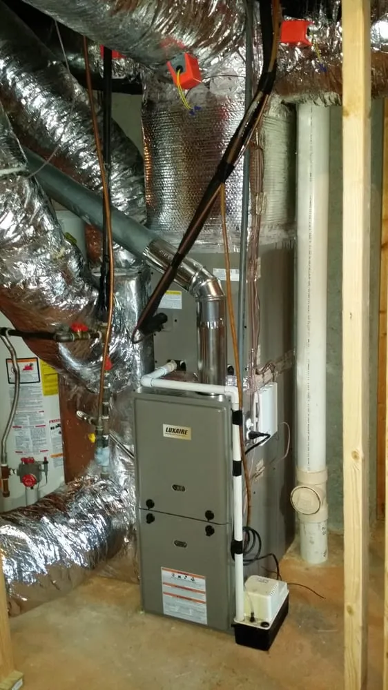 Slide of Heating and Air Services by Kelly Cogar