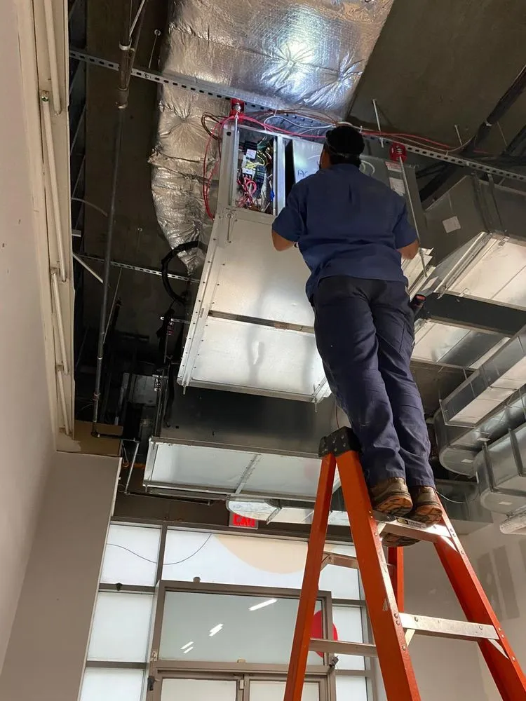 Professional air conditioning tune-up for homes across Flushing, NY - Heating, Cooling & Electric Solutions