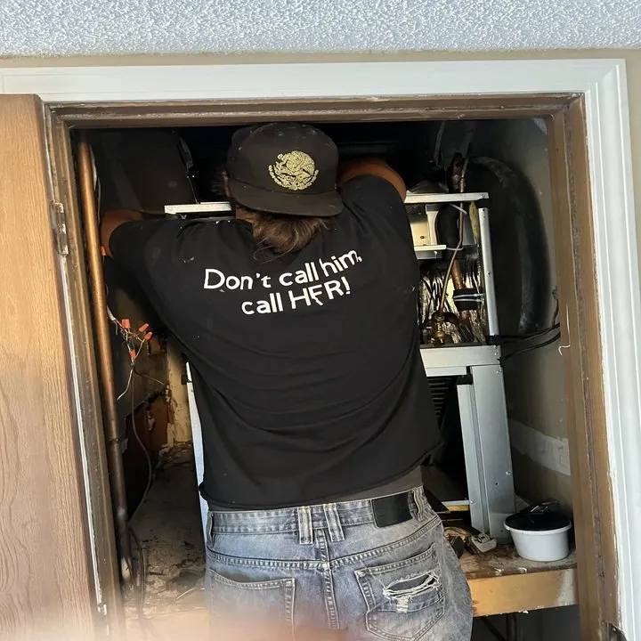 Slide of HER Heating Cooling & Plumbing