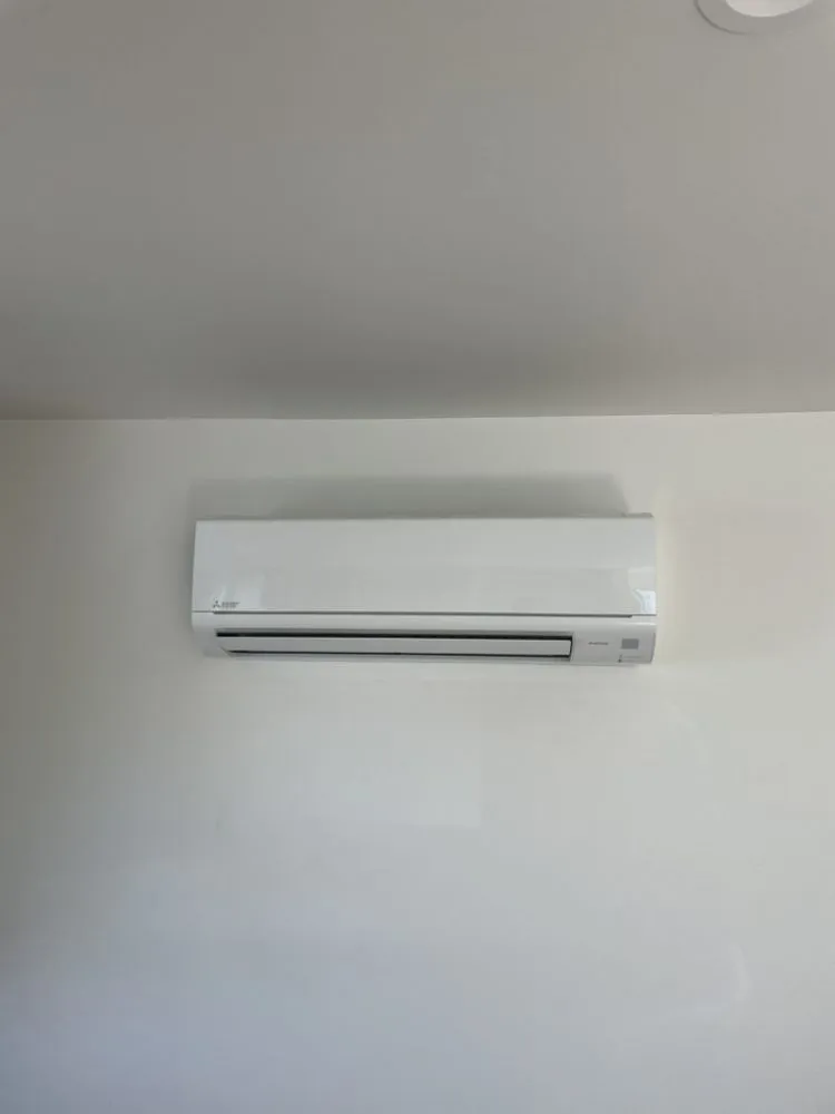 Slide of Howie’s Heating and Air