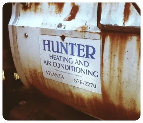 Hunter Heating & Air Conditioning Company Logo