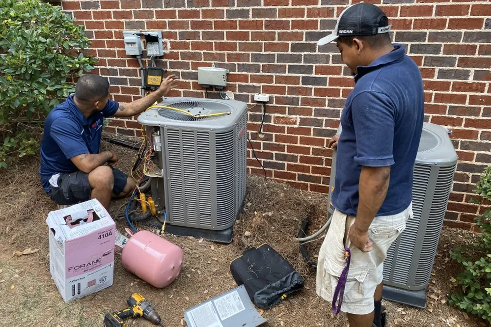 Slide of HVAC Guyz & Plumbing