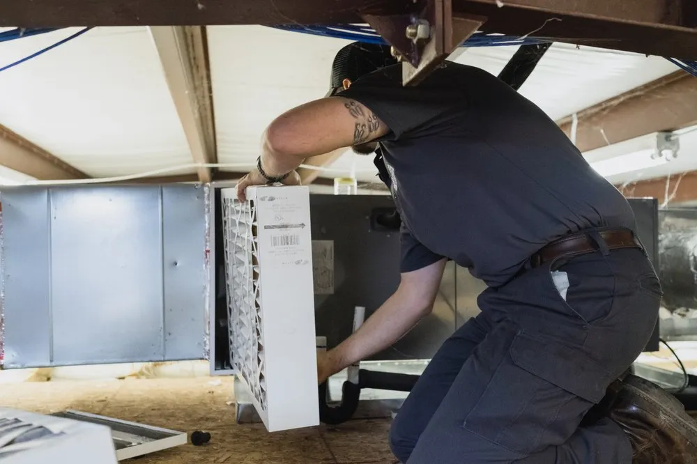 Slide of Indoor Climate Experts - Heating and Cooling Services