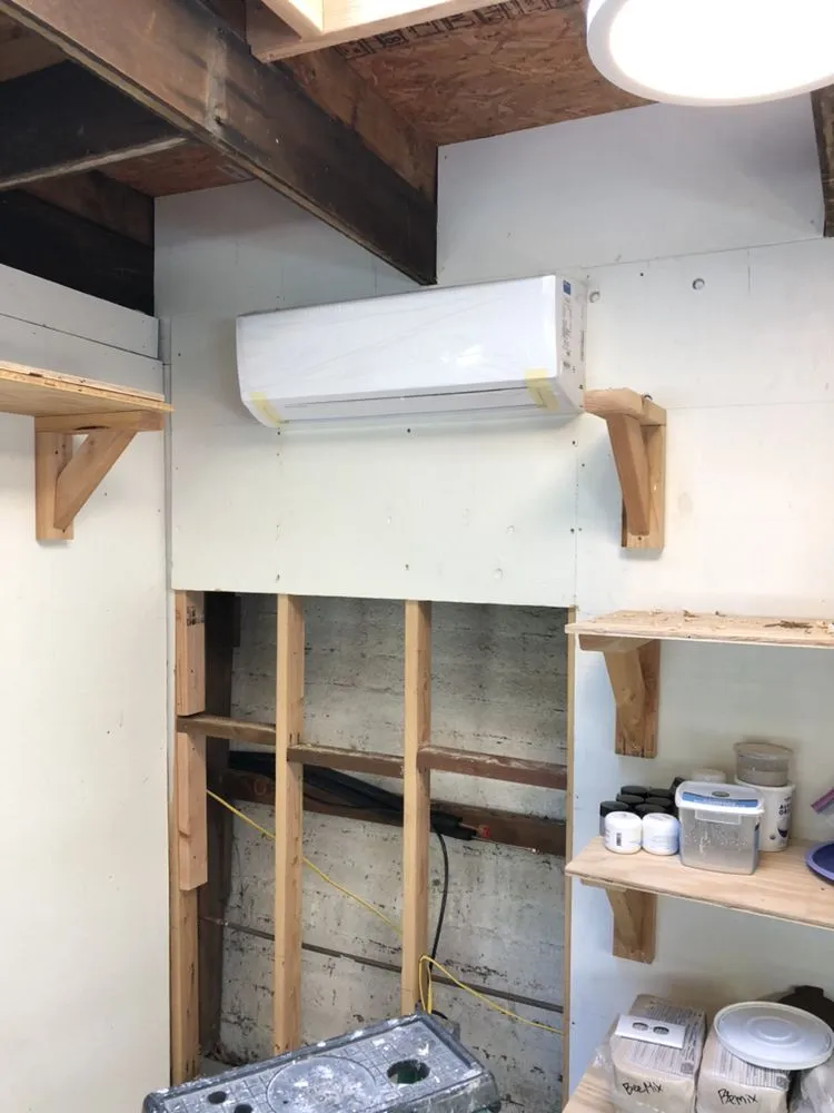 Slide of Iwai Cooling & Heating