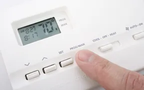 Slide of J & E Heating