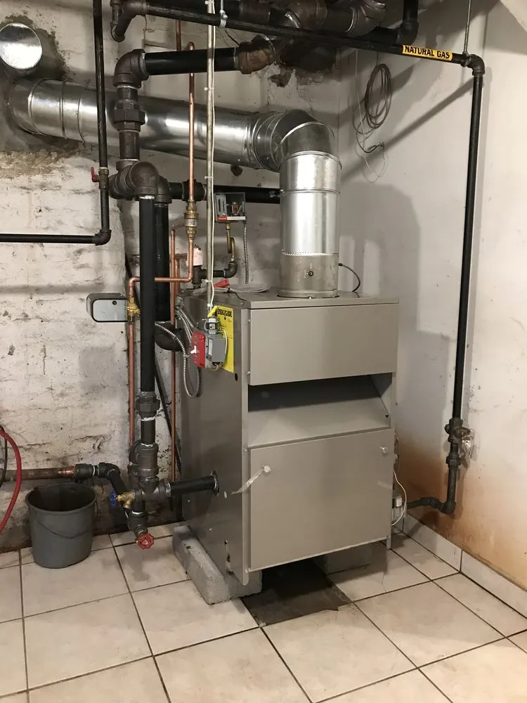 Slide of J A J Cooling , Heating & Construction