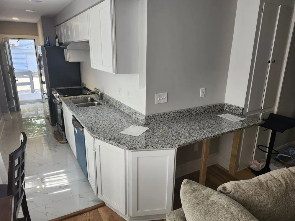 Slide of J H Construction