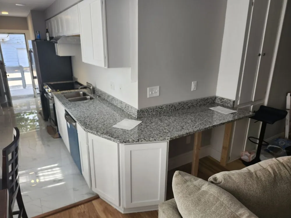 Slide of J H Construction