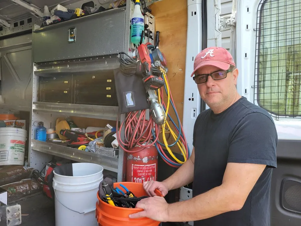 Slide of JD The Handyman