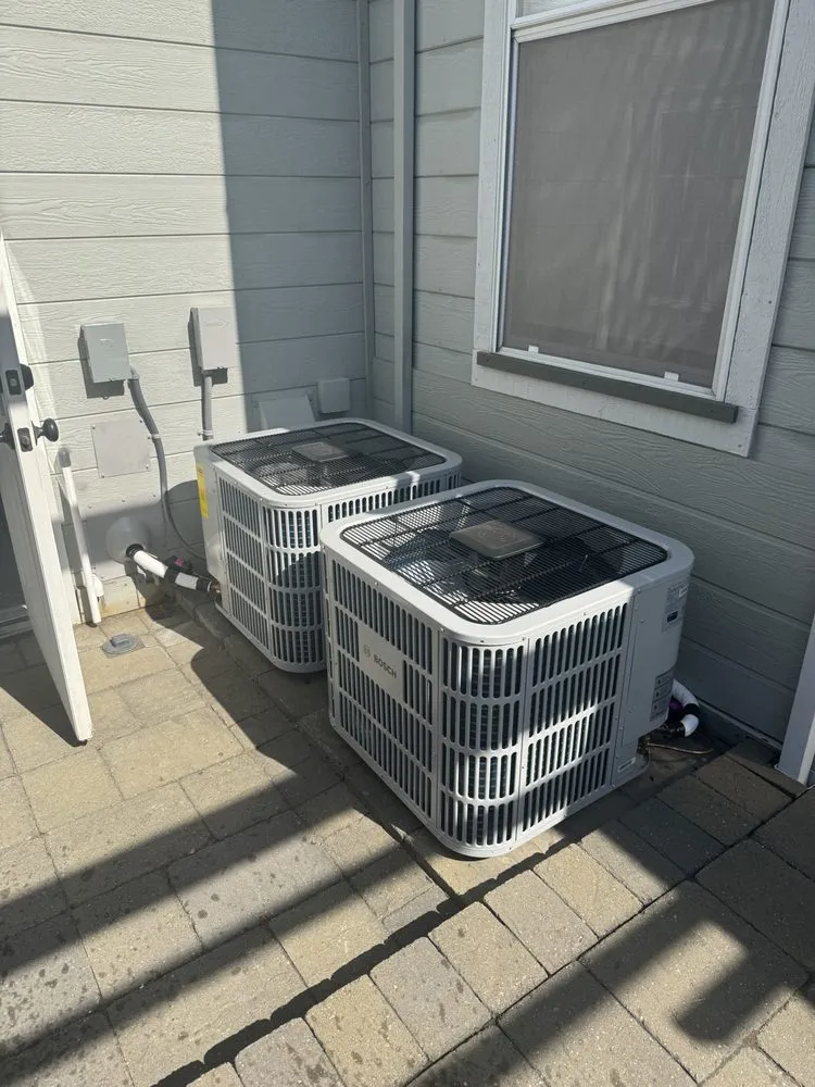 Slide of JE Moore Air Conditioning