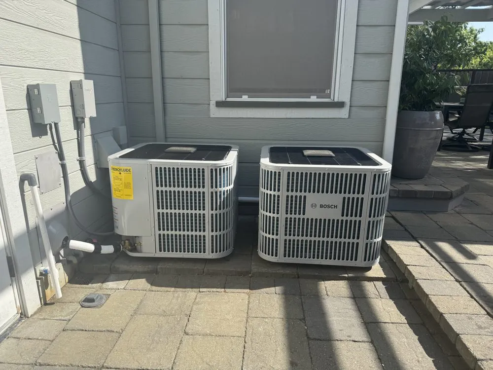 Slide of JE Moore Air Conditioning