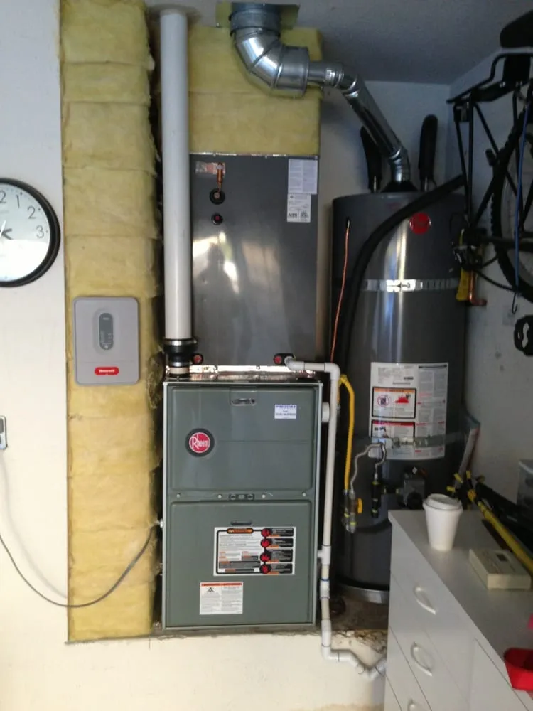 Slide of JE Moore Air Conditioning