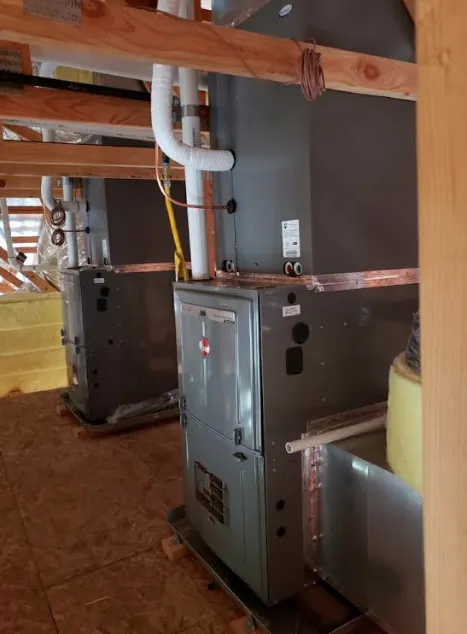 Slide of JE Moore Air Conditioning