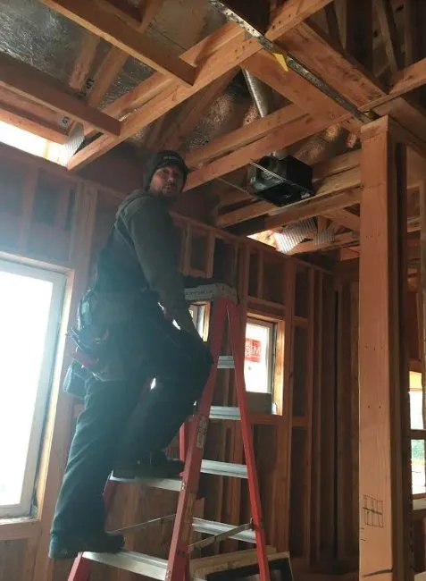 Slide of JE Moore Air Conditioning