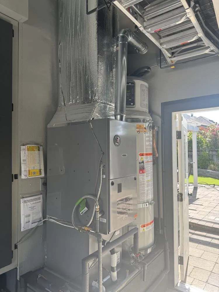 Slide of JE Moore Air Conditioning