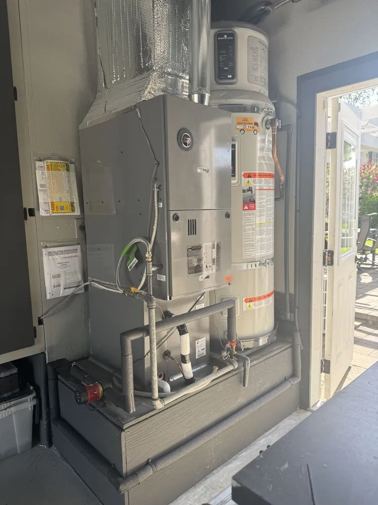 Slide of JE Moore Air Conditioning