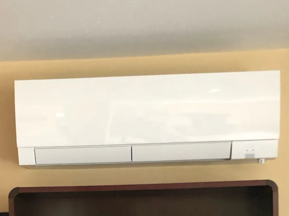 Slide of Jenny’s Heating & Cooling