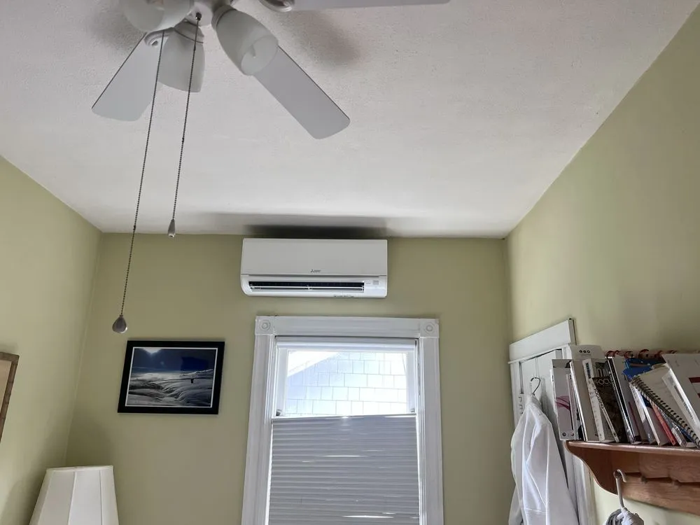 Slide of Joe C heating & cooling