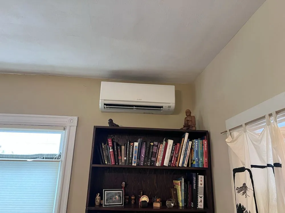 Slide of Joe C heating & cooling