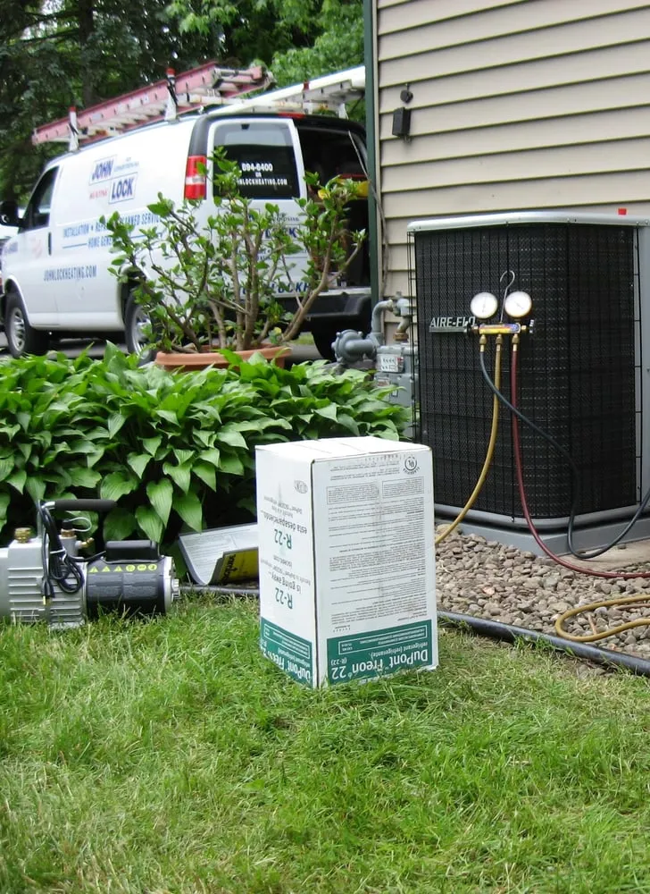 Slide of John Lock Air Conditioning & Heating Service Inc.