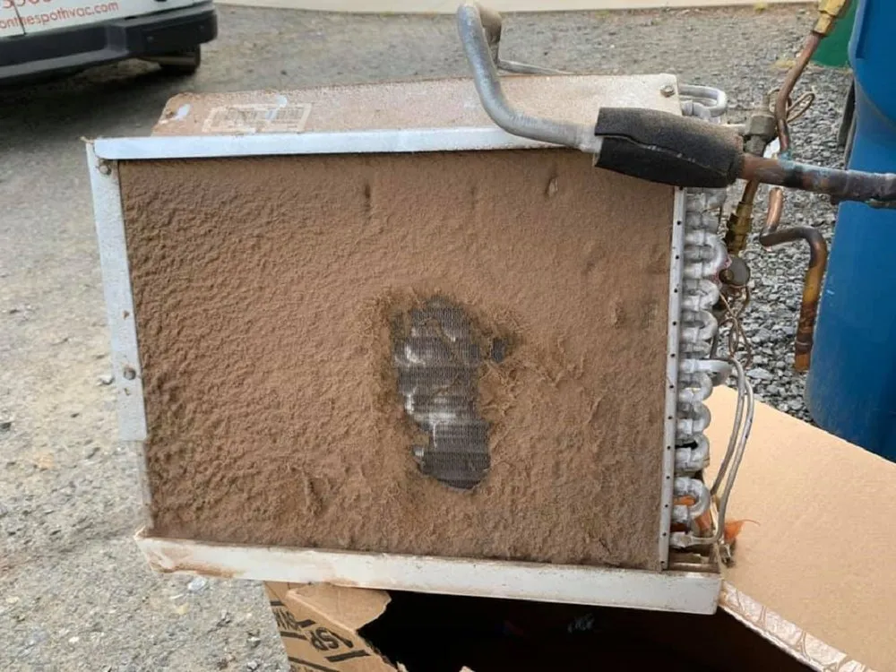 Slide of Johnny On The Spot Heating & Cooling