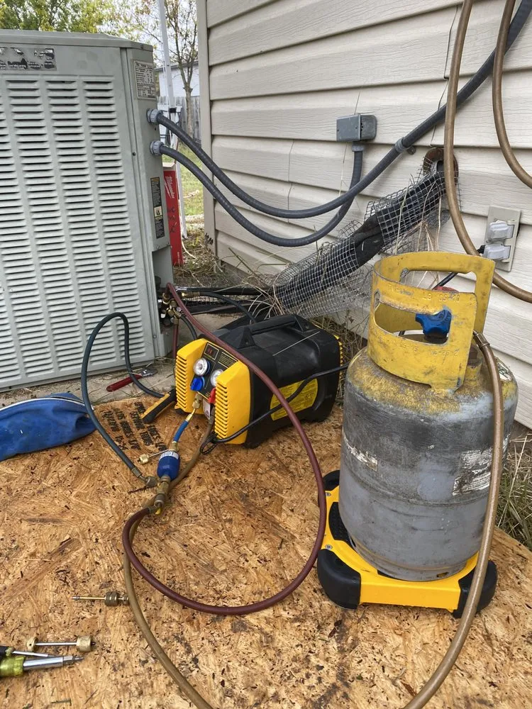 Slide of Johnny On the Spot Heating & Cooling