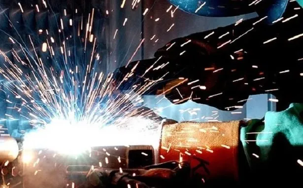 Slide of Johnny's Boiler Shop & Metal Works